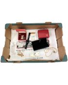 A box containing Garmin watch, costume jewellery, St Christopher pendant,