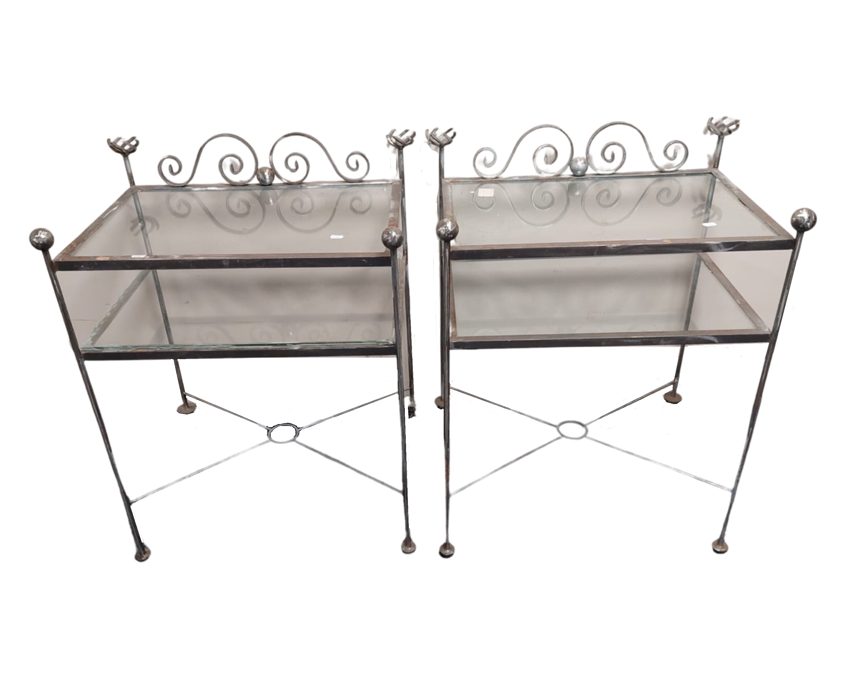 A pair of Barker and Stonehouse polished steel glass topped two tier bedside tables