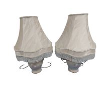 A pair of contemporary floral table lamps with shades