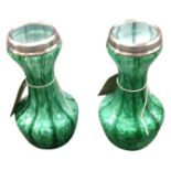 A pair of Art Deco silver-rimmed green glass vases, London marks, 1928, height 16 cm.
