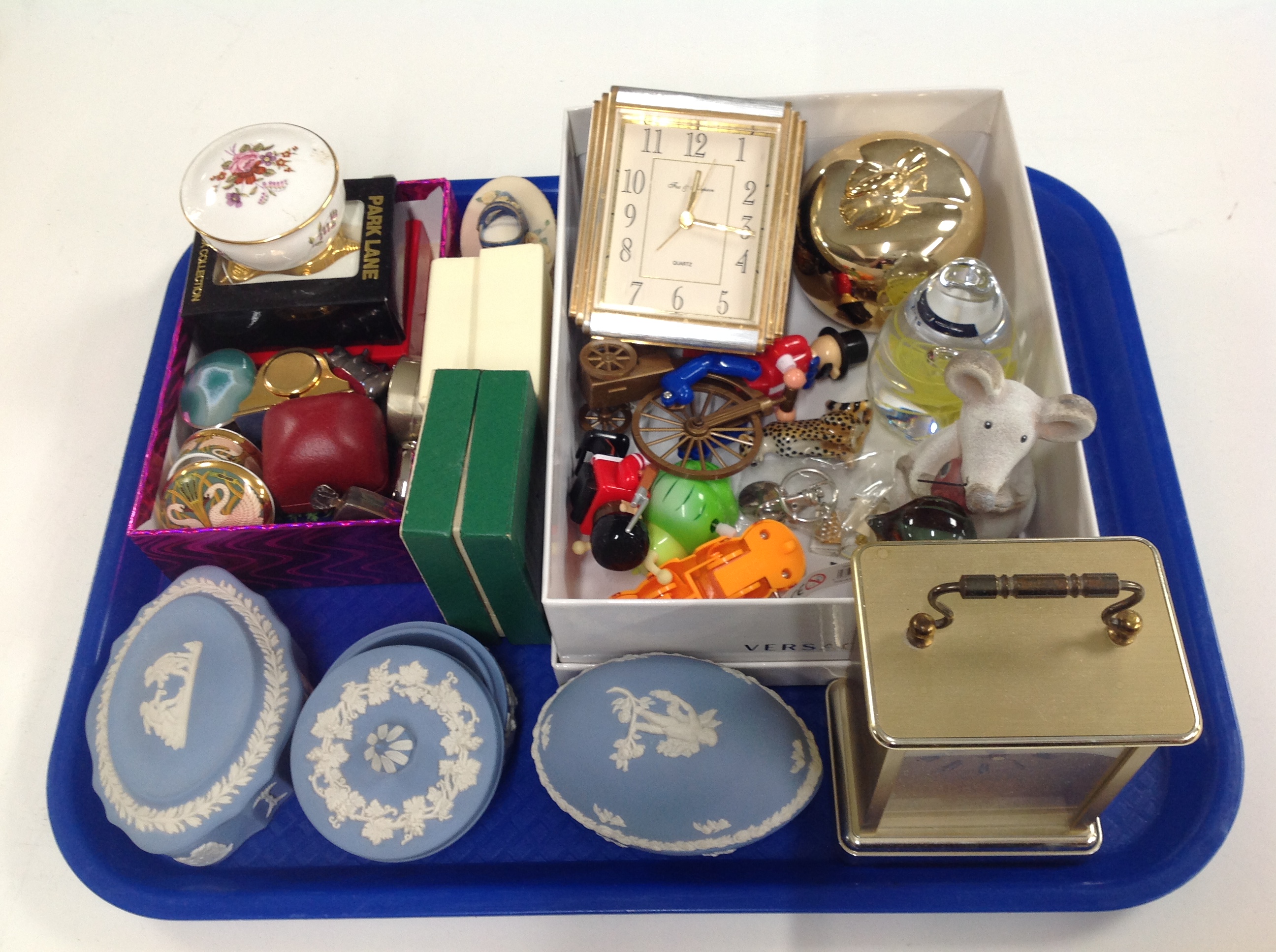 A tray of Wedgwood jasperware trinket pots, miniature trinket pots, carriage clock,