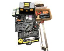 Three boxes containing boxed and unboxed hand and power tools, a cased laser level,