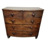 A Victorian mahogany bow fronted chest of five drawers.