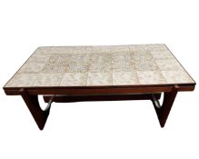 A Continental tile topped rectangular coffee table.