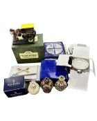 A box containing Ringtons collectibles including horse and cart figure together with further china,