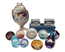 A Murano glass fish together with a quantity of commemorative glass paperweights.