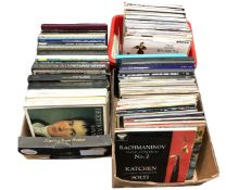 Three boxes containing a collection of classical LPs and box sets.