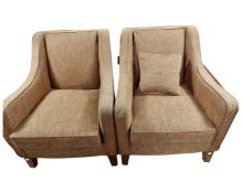 A pair of contemporary armchairs.