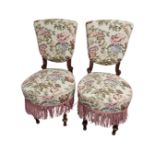 A pair of beech tapestry upholstered salon chairs.