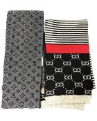 Two scarves : Gucci and Louis Vuitton.