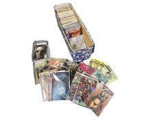 A box containing a large quantity of comics including Classic's Illustrated and Marvel comics