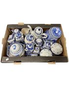 A box containing a quantity of Ringtons blue and white china.