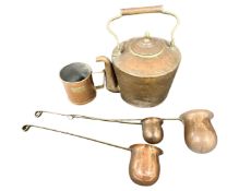 A Victorian copper kettle, a similar mug and three ladles.