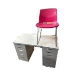 A contemporary white twin pedestal desk fitted with ten drawers together with a plastic chair.