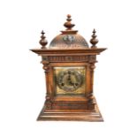 An Edwardian oak cased eight day mantel clock,