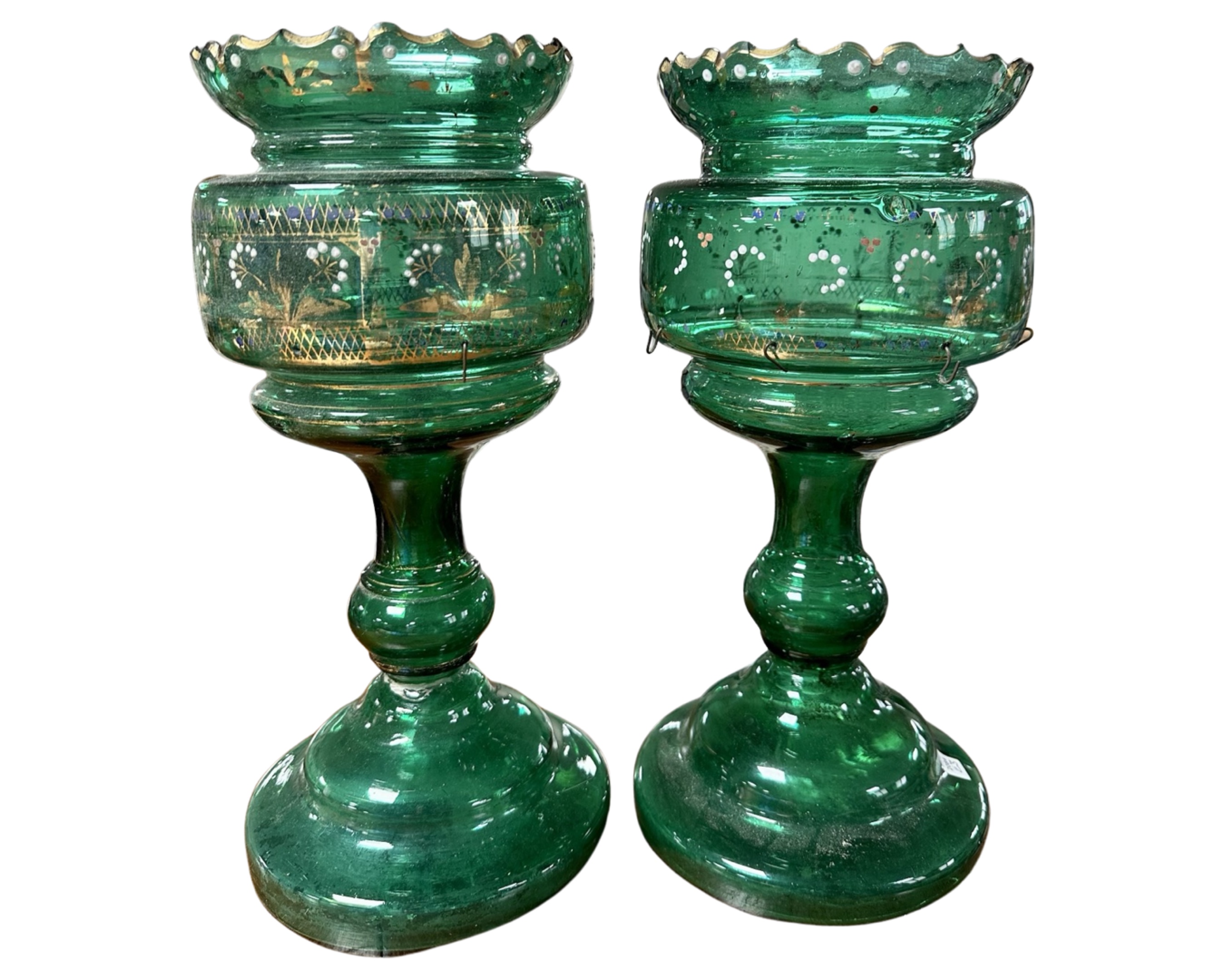 A pair of late Victorian green glass table lustres together with a quantity of crystal drops.