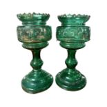 A pair of late Victorian green glass table lustres together with a quantity of crystal drops.