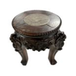 A miniature Chinese carved hardwood and inset marble jardiniere stand.