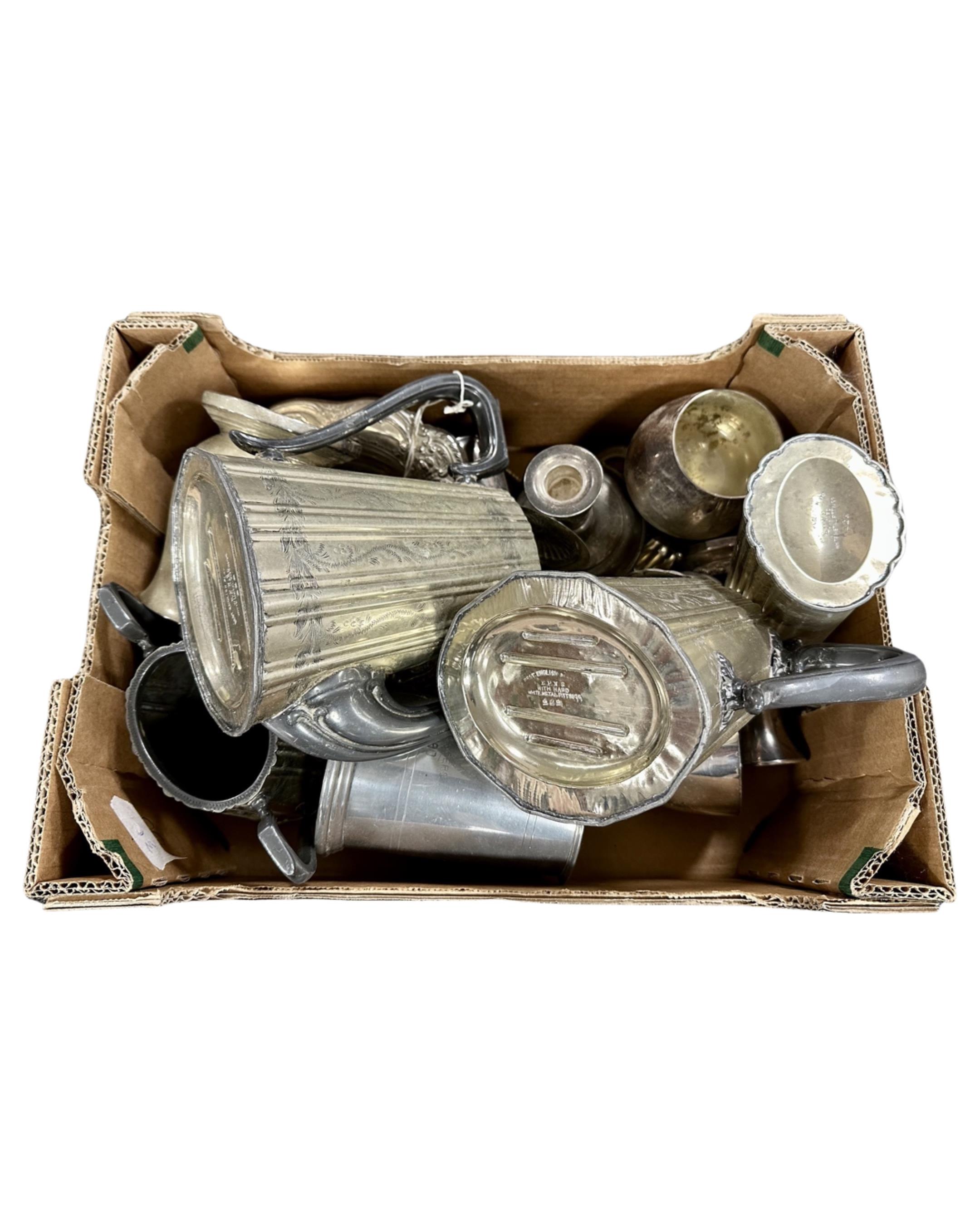 A box containing a quantity of silver plated tea wares, a candlestick etc.