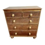A Victorian stained pine chest of five drawers,