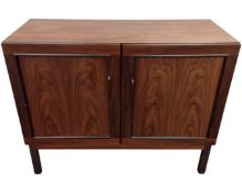 A Scandinavian rosewood veneered two door side cabinet.