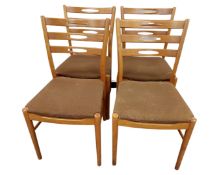 A set of four Scandinavian teak dining chairs.
