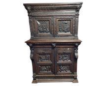 A 19th century Dutch heavily carved oak cabinet on stand,
