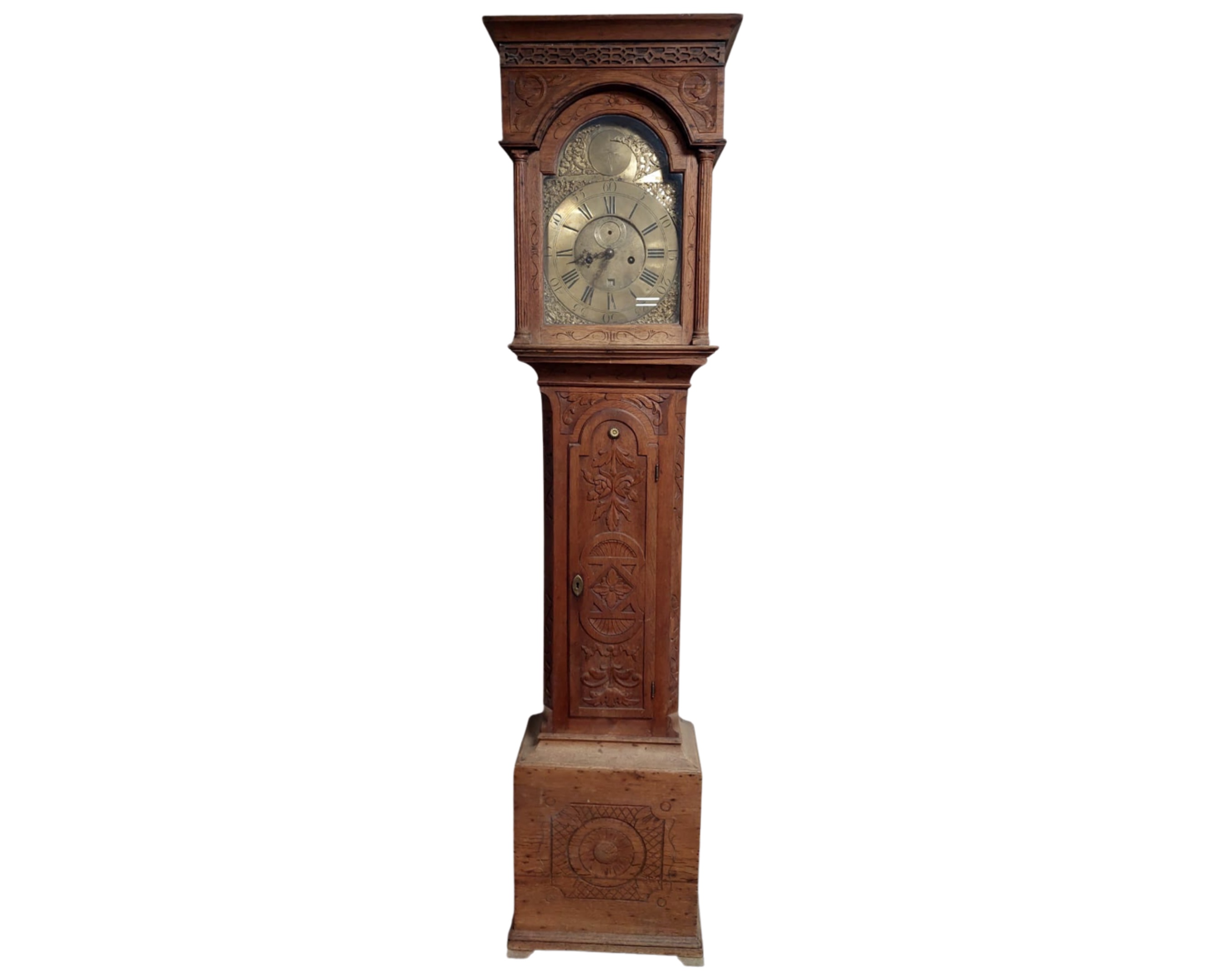 A 19th century Continental carved oak 30 hour long case clock with brass dial and weights.