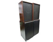 A pair of Finnish speakers in rosewood effect cases together with a further pair of speakers