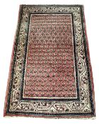 A North-West Iranian rug, 130cm by 85cm.