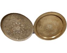 Two Islamic brass chargers.