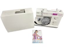 A Pfaff Hobby 1132 sewing machine in box with lead, foot pedal and instructions.