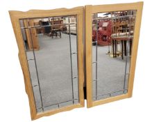 Two blond oak framed mirrors, each 50cm by 90cm.