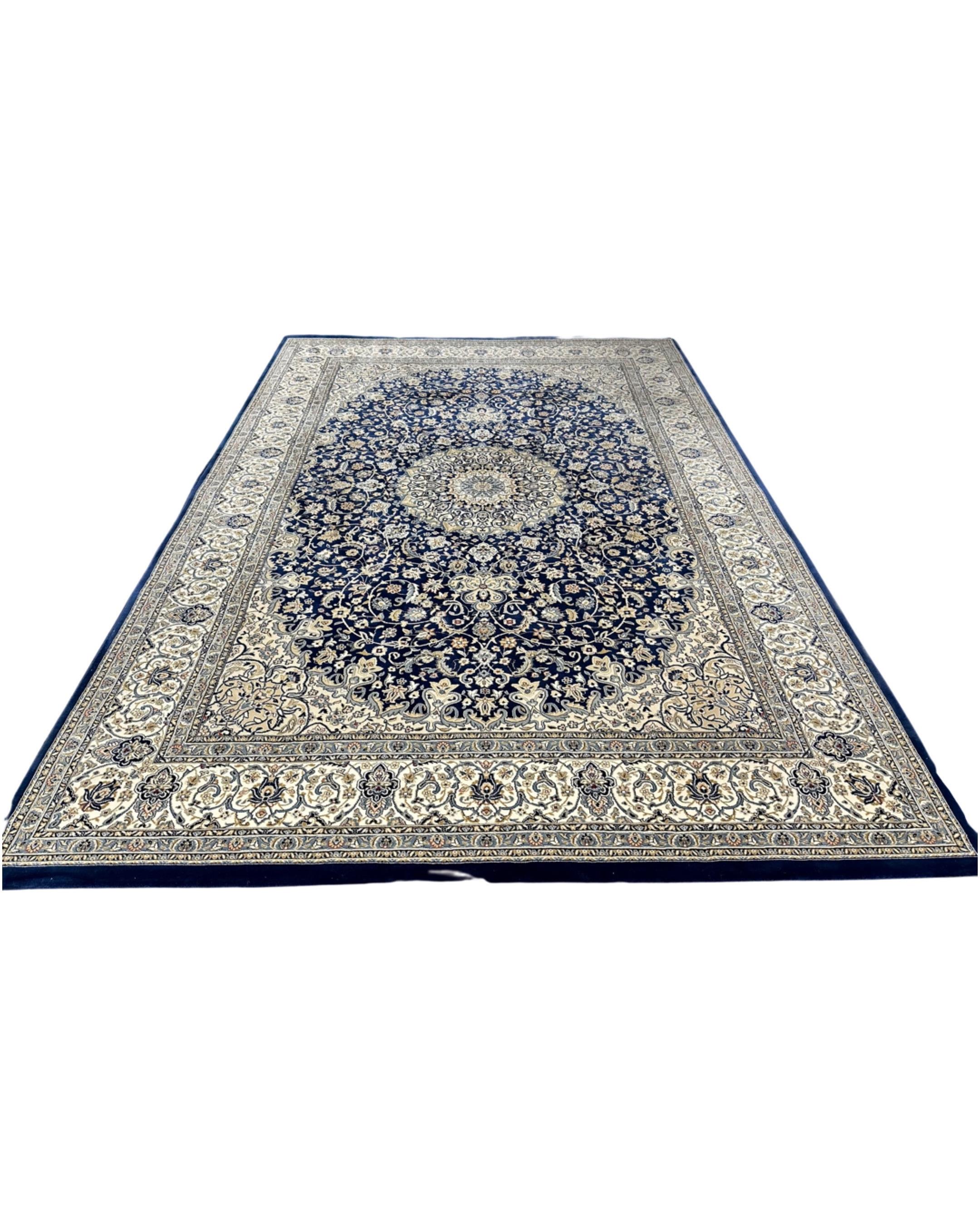 A machine made carpet of Persian Tabriz design, 342cm by 240cm.