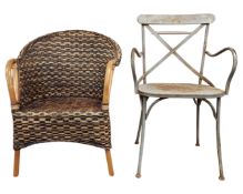 A metal garden armchair together with a wicker chair.