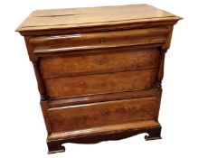 A 19th century elm four drawer chest.