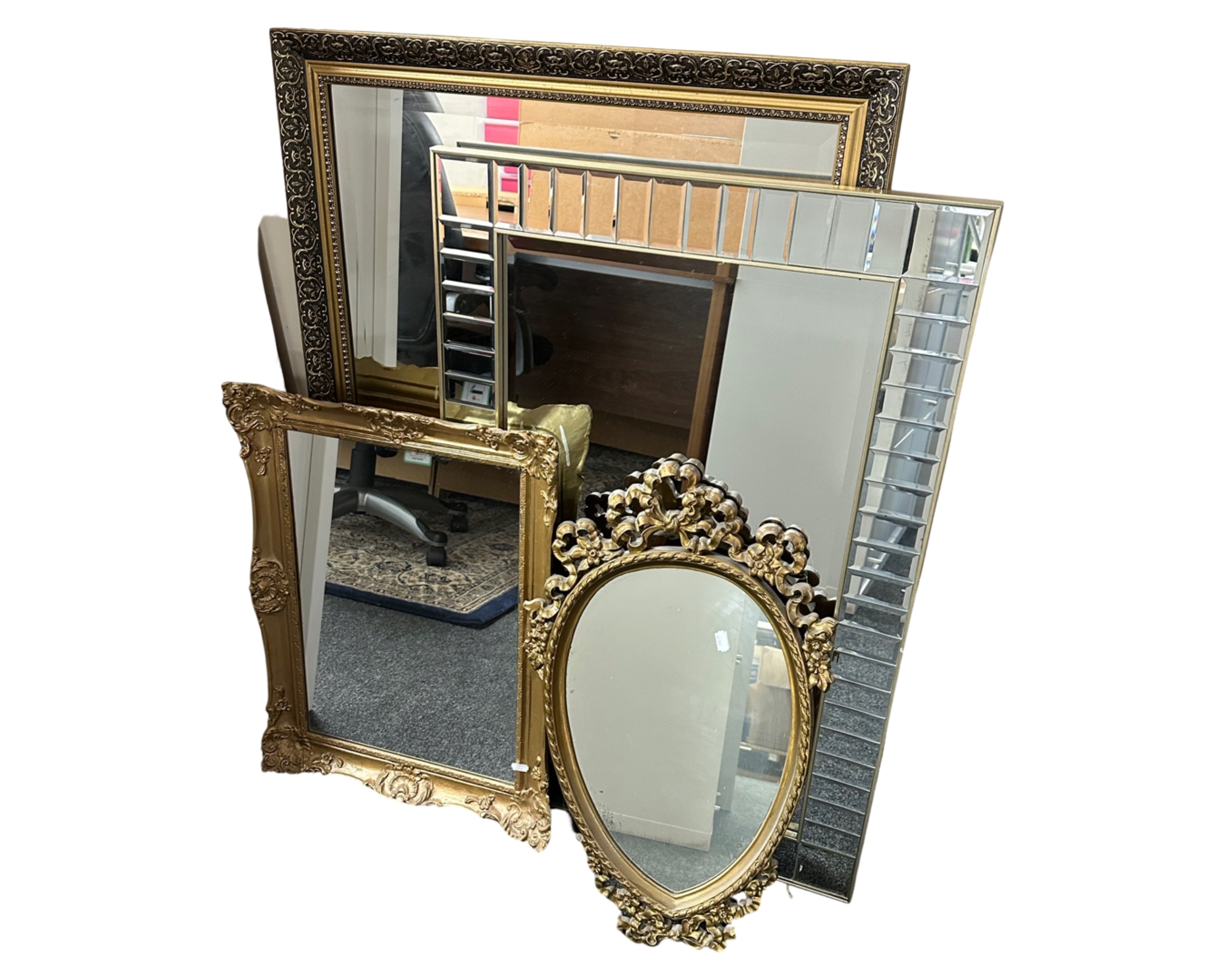Four contemporary gilt mirrors (largest 72 cm x 102 cm)