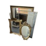 Four contemporary gilt mirrors (largest 72 cm x 102 cm)