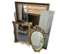 Four contemporary gilt mirrors (largest 72 cm x 102 cm)