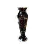 A Twentieth Century ruby glass tapered vase, with decorative silvered overlay, on circular base,