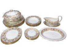 A collection of approximately 27 pieces of Wedgwood gold Damask dinner china (on two trays).