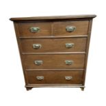 An Edwardian five drawer chest,