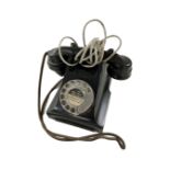 An antique bakelite telephone