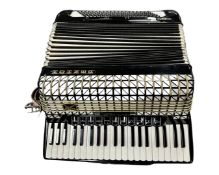 A Hohner Atlantic IV De Luxe piano accordion.