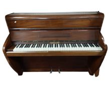 A Challen mahogany cased piano.