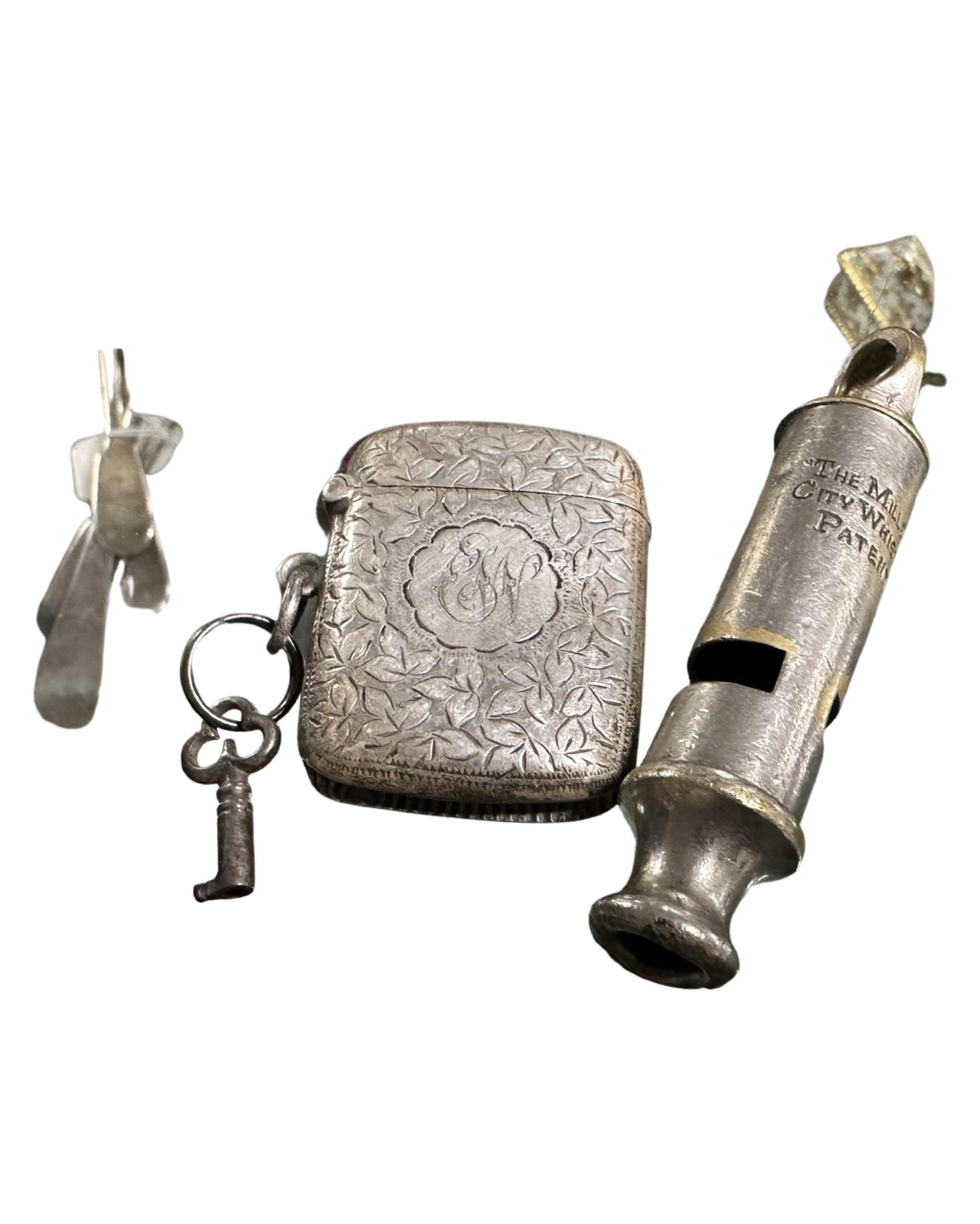 A Millbro policeman's whistle together with a silver Vesta case.