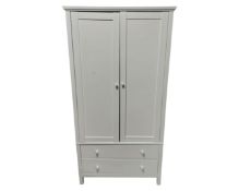 A contemporary white double door wardrobe fitted with two drawers