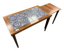 A nest of two Scandinavian rosewood and tile inset coffee tables.