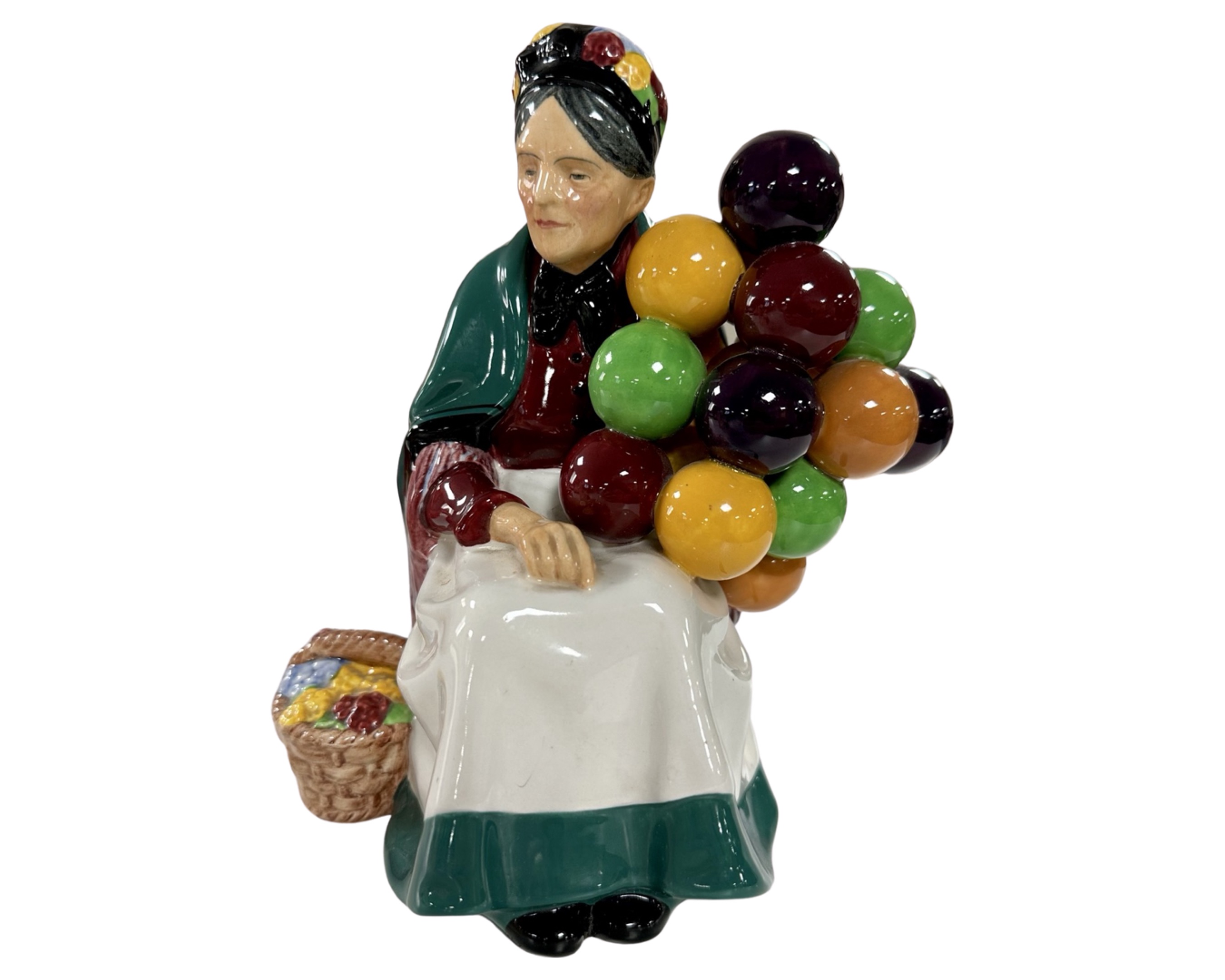 A Royal Doulton figure - The Old Balloon Seller HN 1315