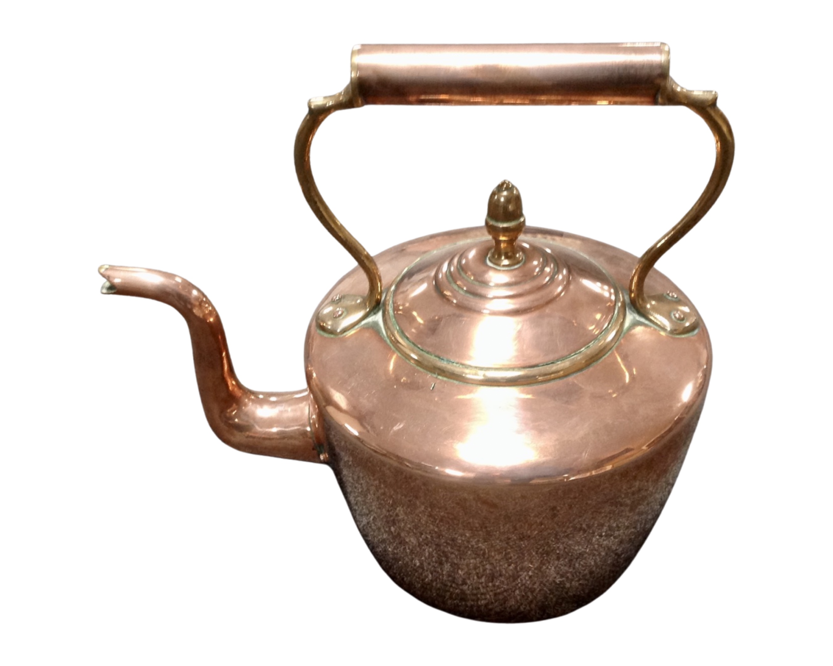 A Victorian copper and brass kettle.